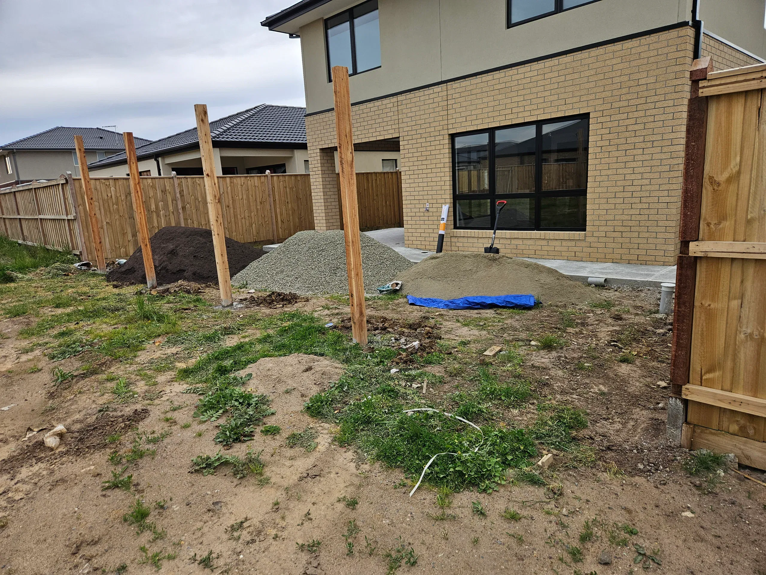Timber paling fencing installation