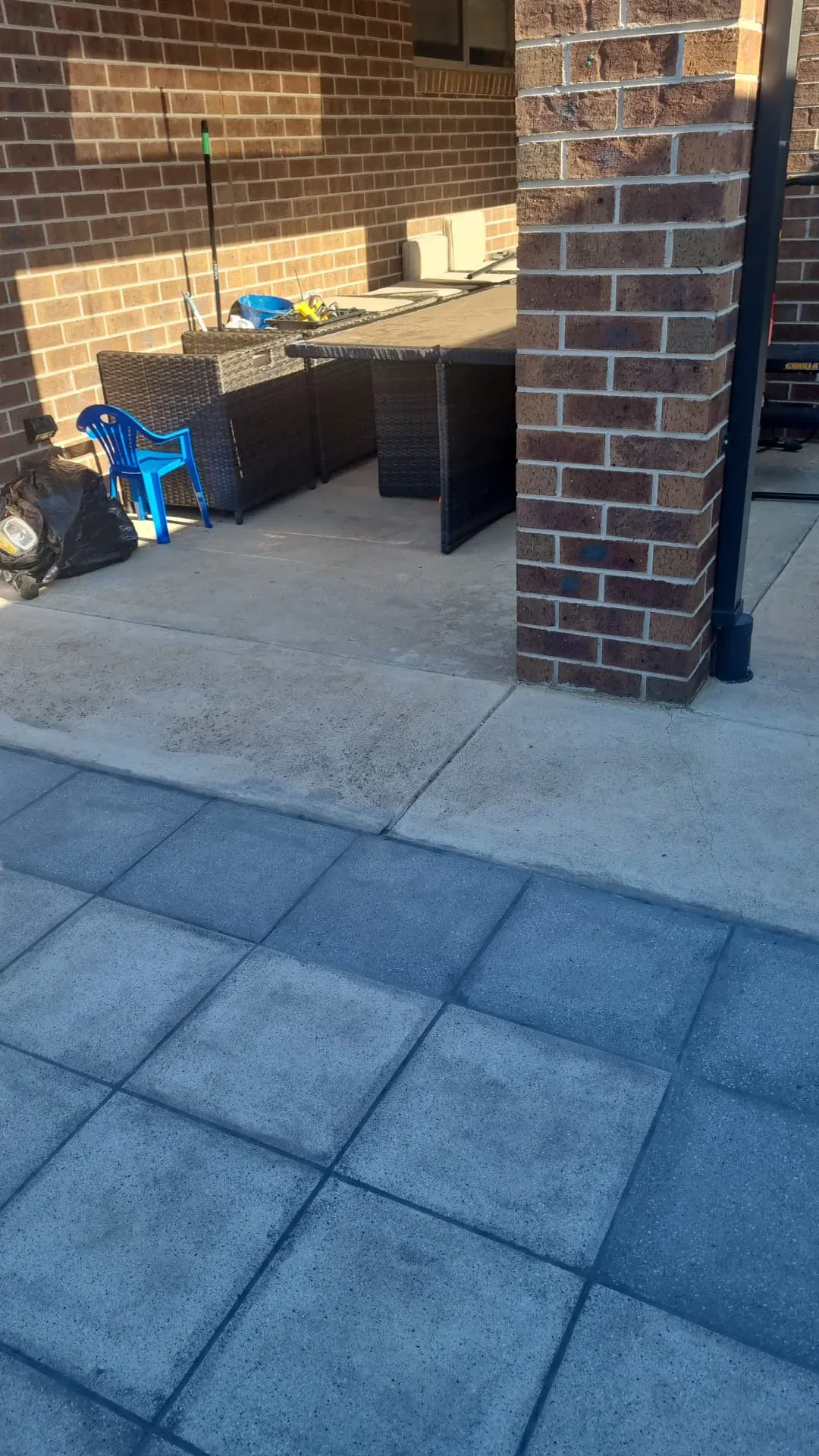 Composite deck tiles laid over concrete