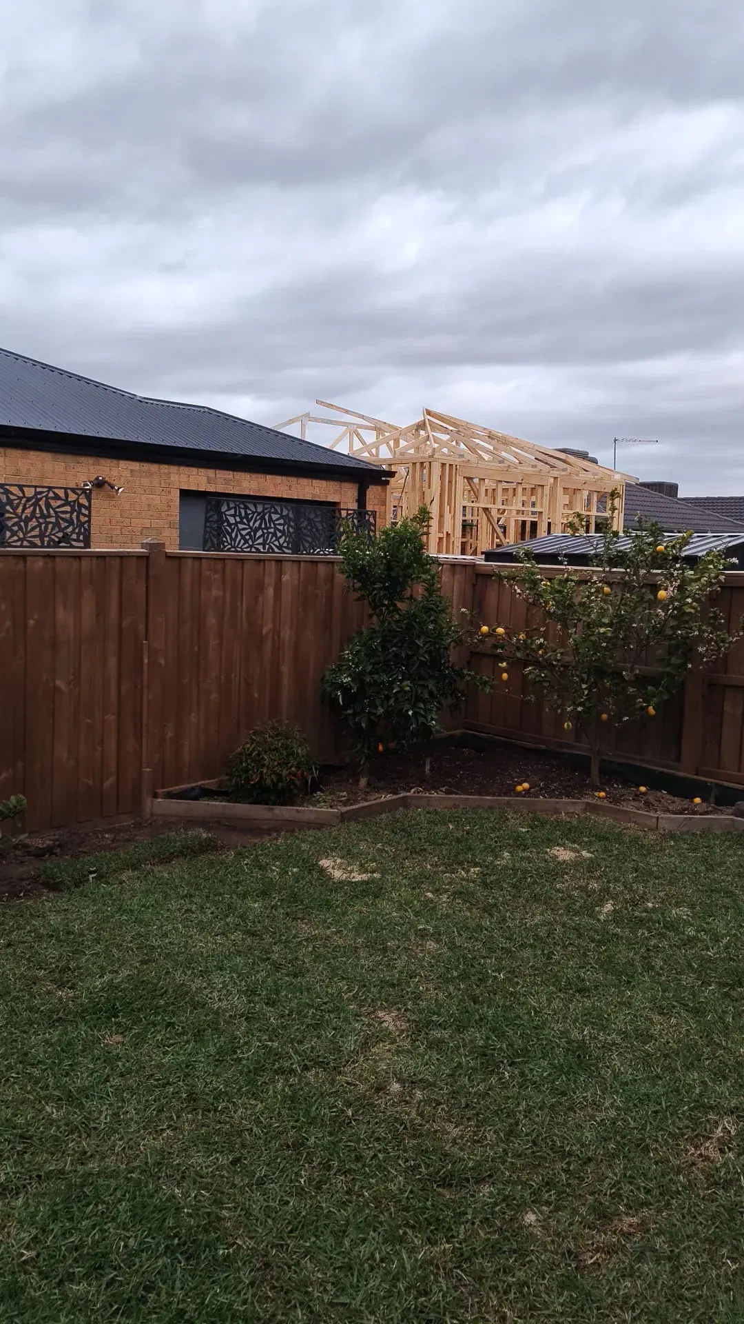 Fence extension with matching palings and topper
