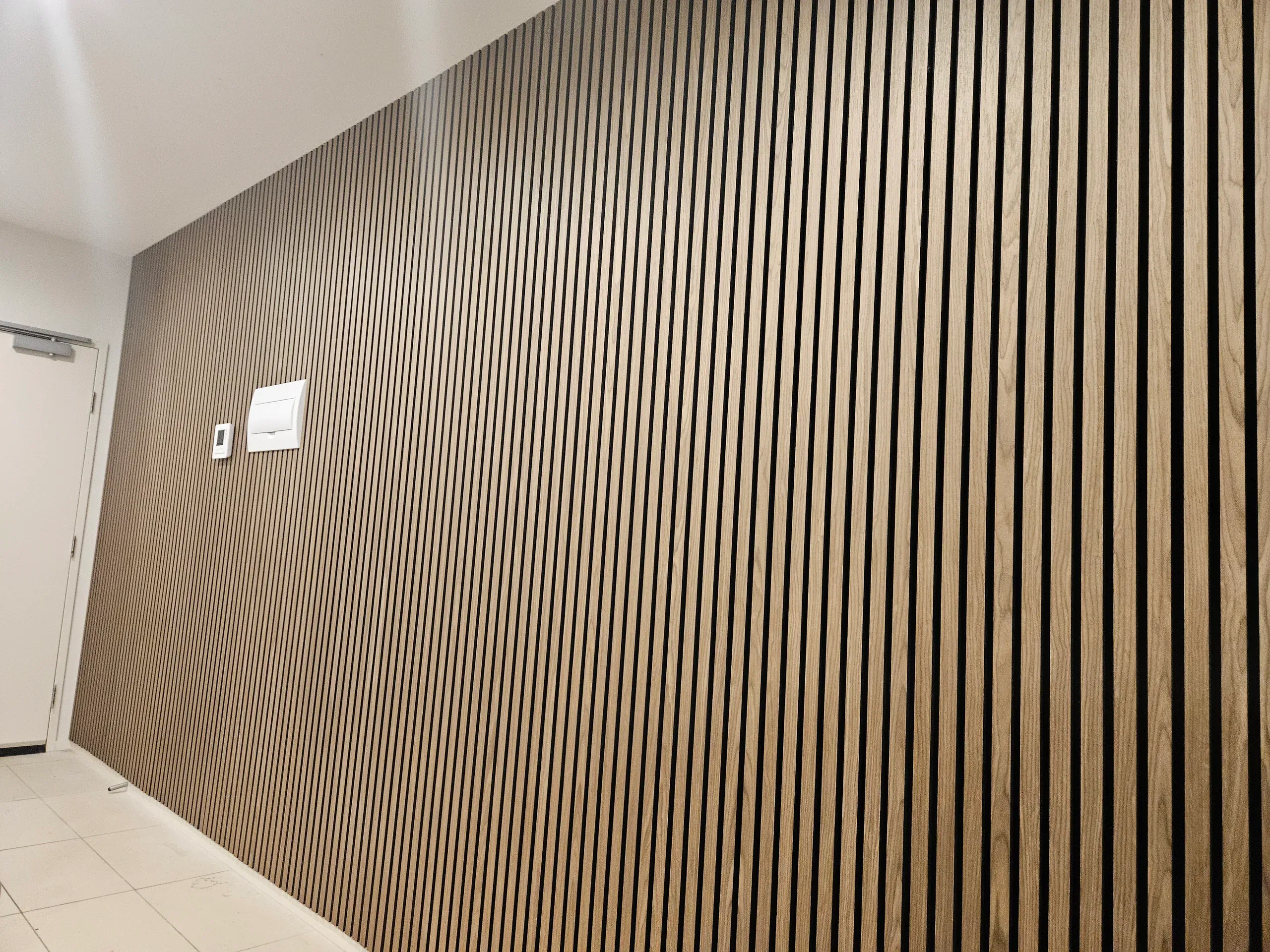 Timber-slat interior cladding feature wall
