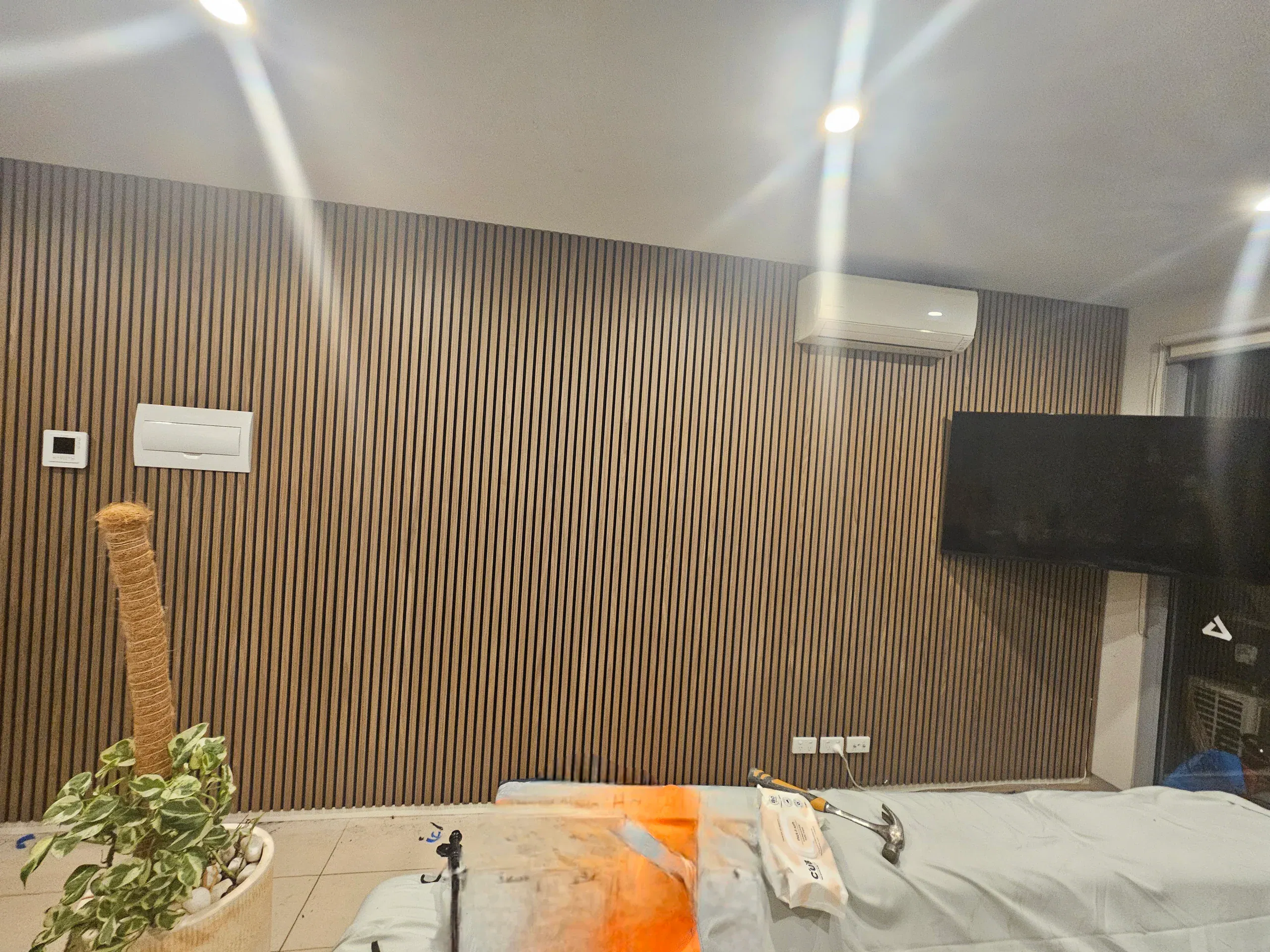 Timber-slat interior cladding feature wall