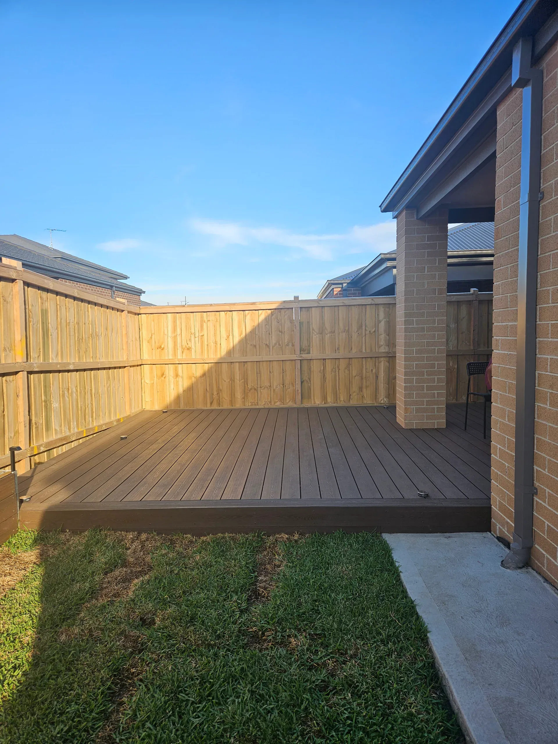 Wollert deck with steps, planters and new lawn
