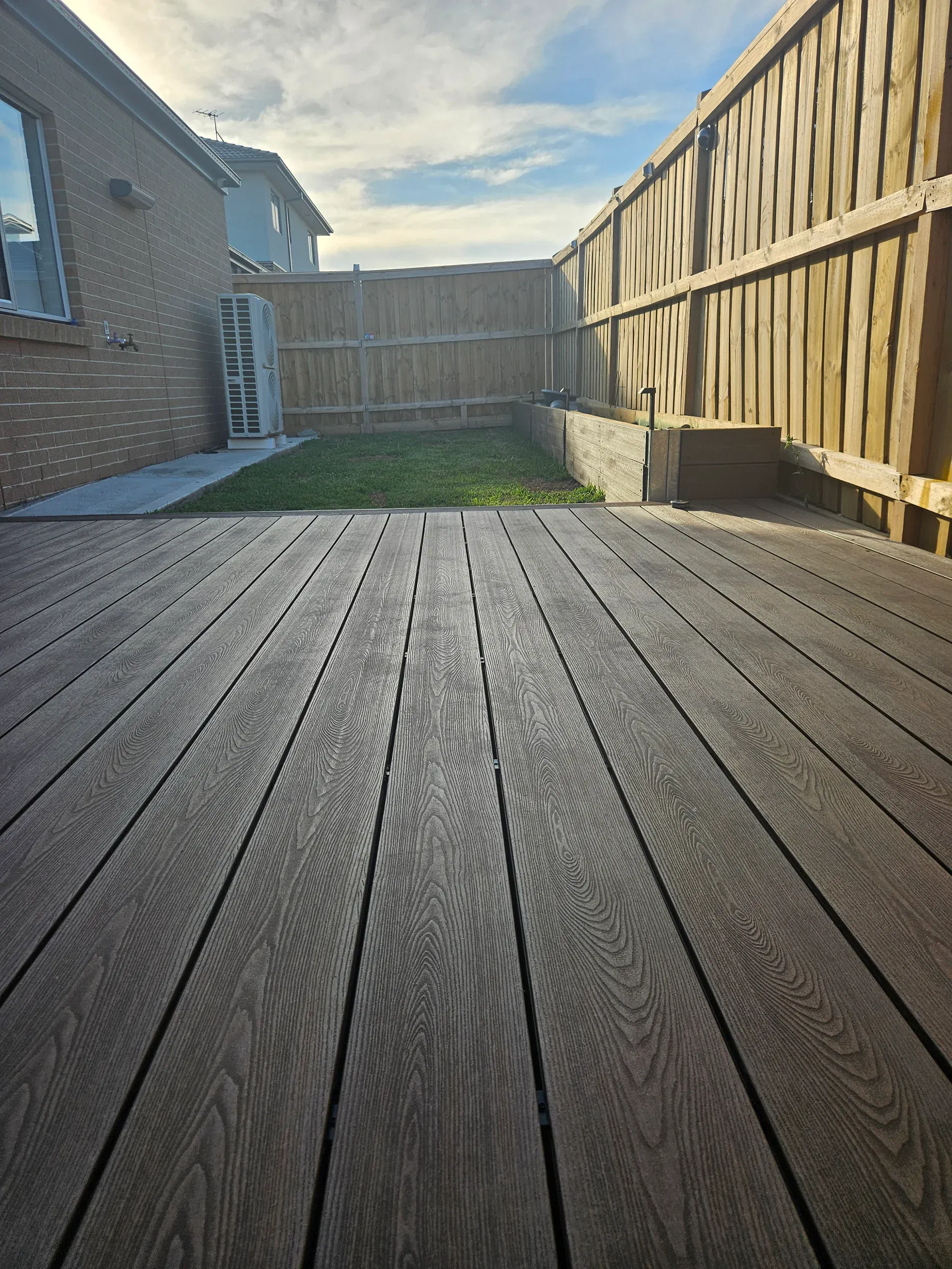 Wollert deck with steps, planters and new lawn