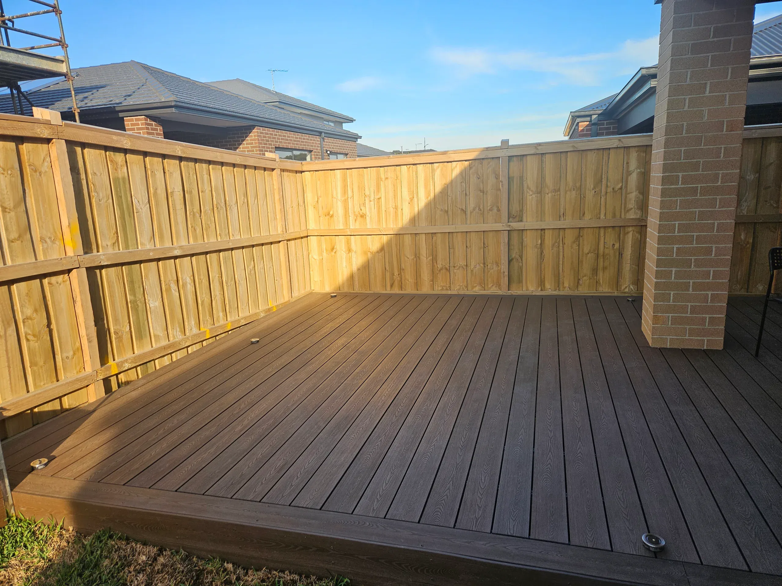 Wollert deck with steps, planters and new lawn