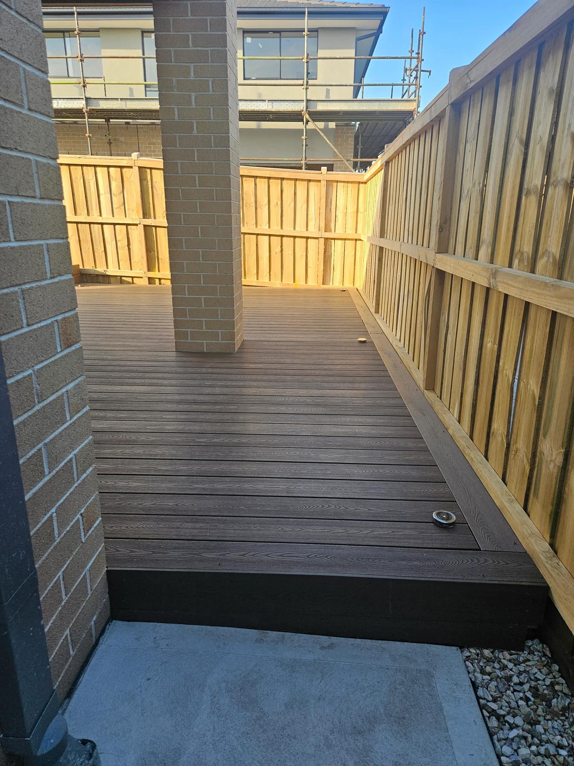 Wollert deck with steps, planters and new lawn
