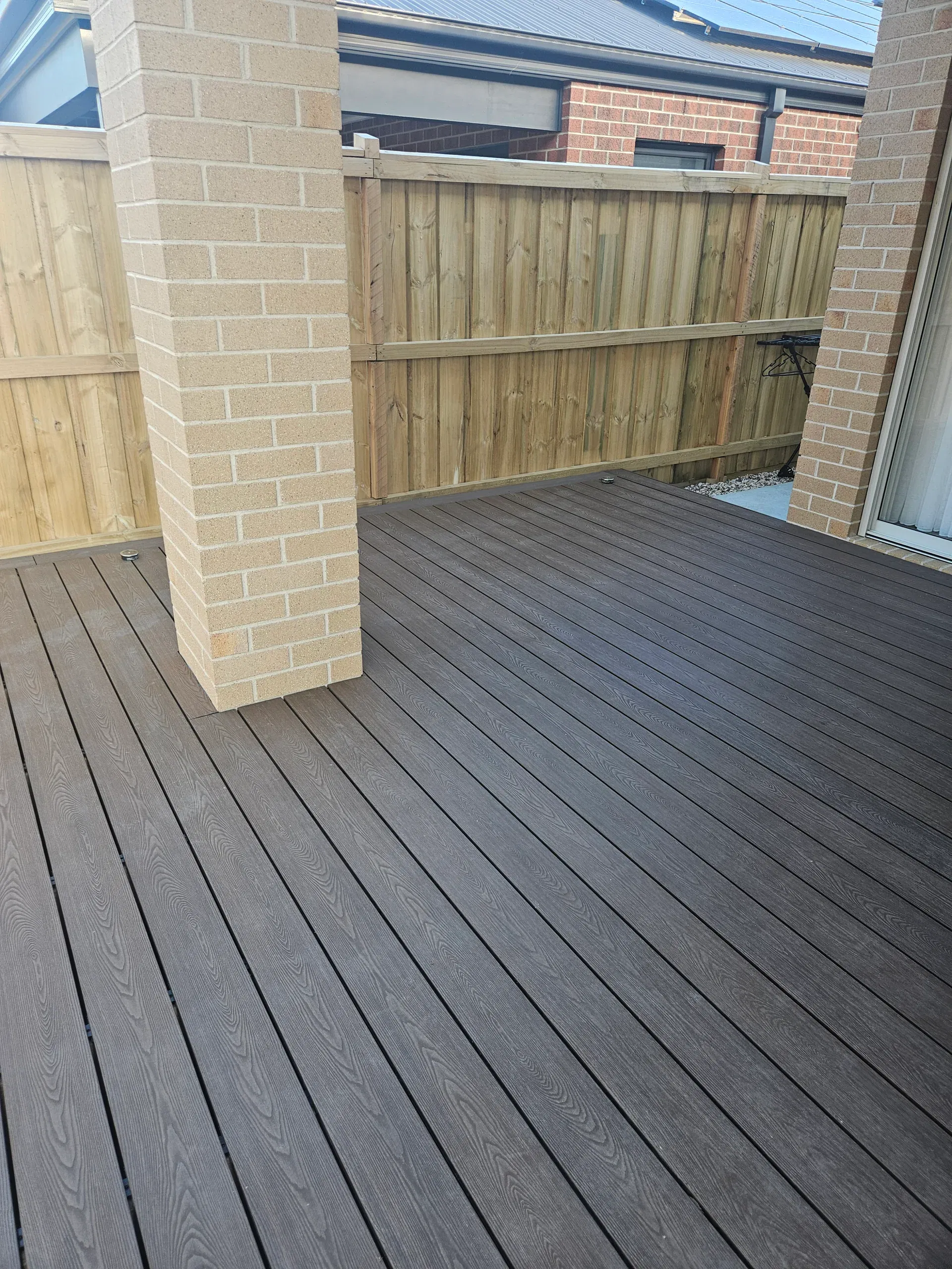 Wollert deck with steps, planters and new lawn
