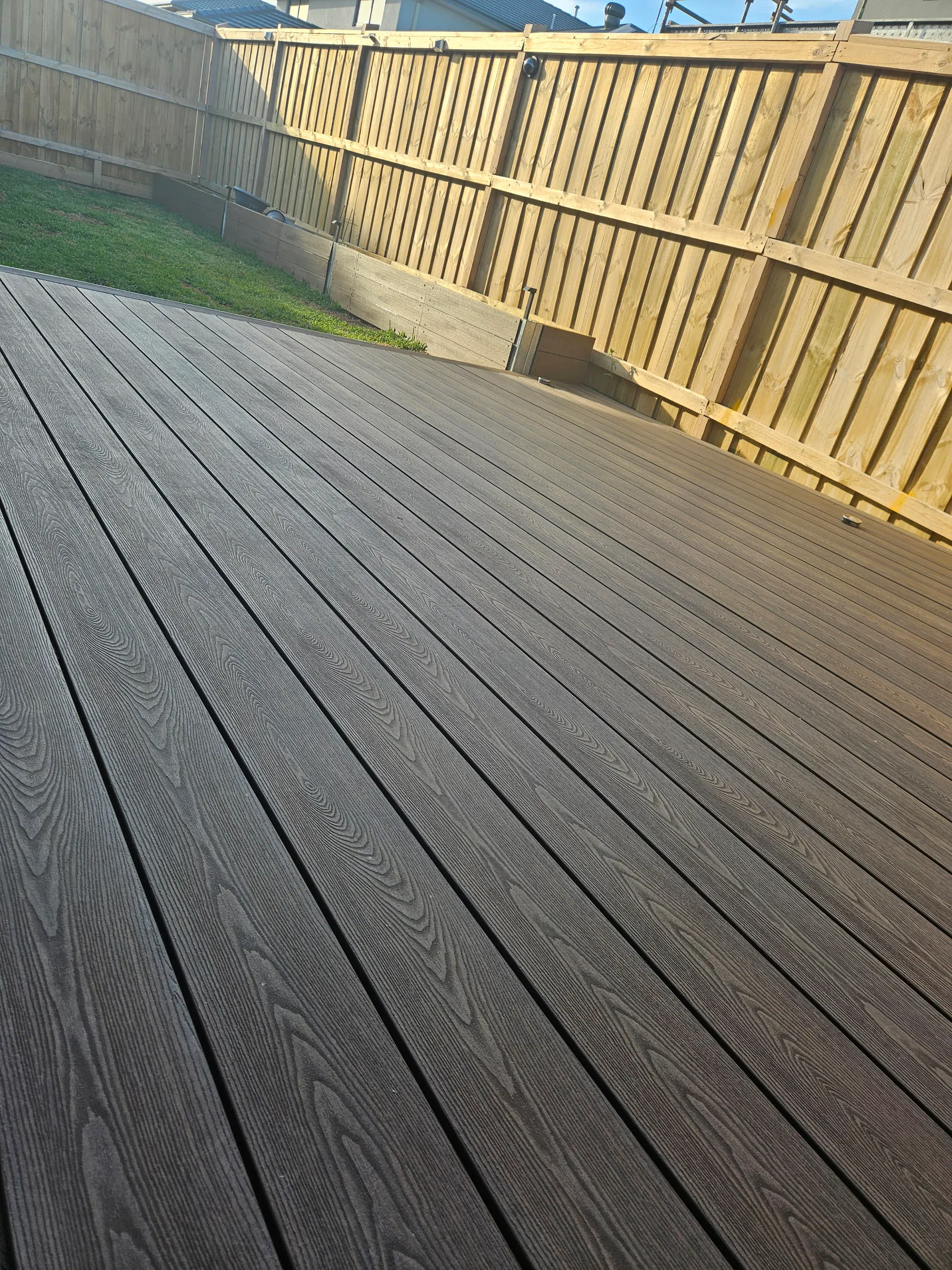 Wollert deck with steps, planters and new lawn