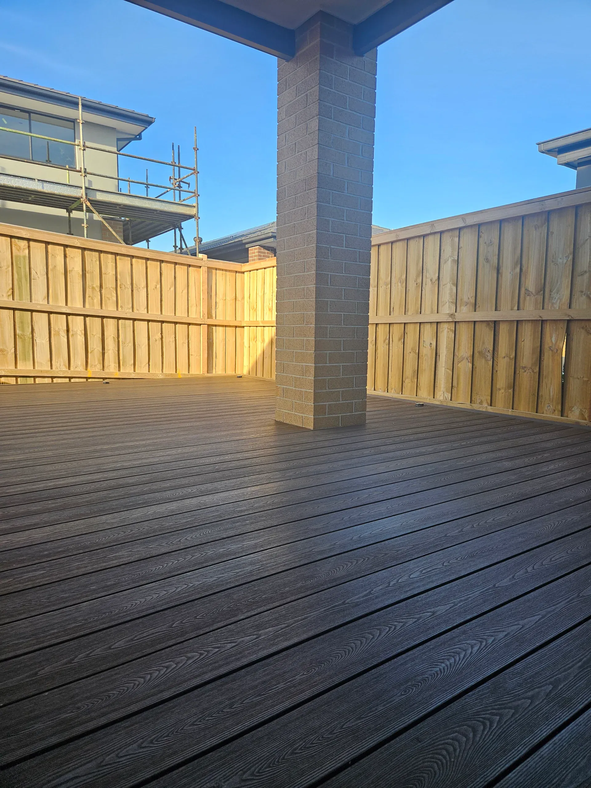 Wollert deck with steps, planters and new lawn