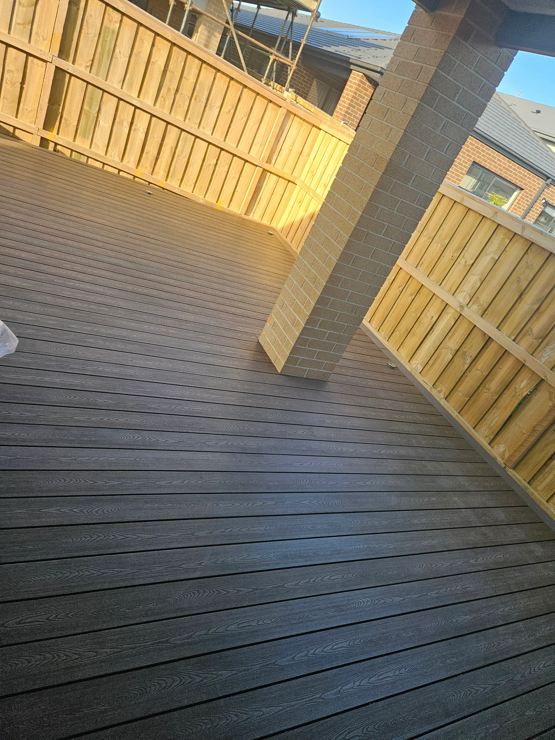Wollert deck with steps, planters and new lawn