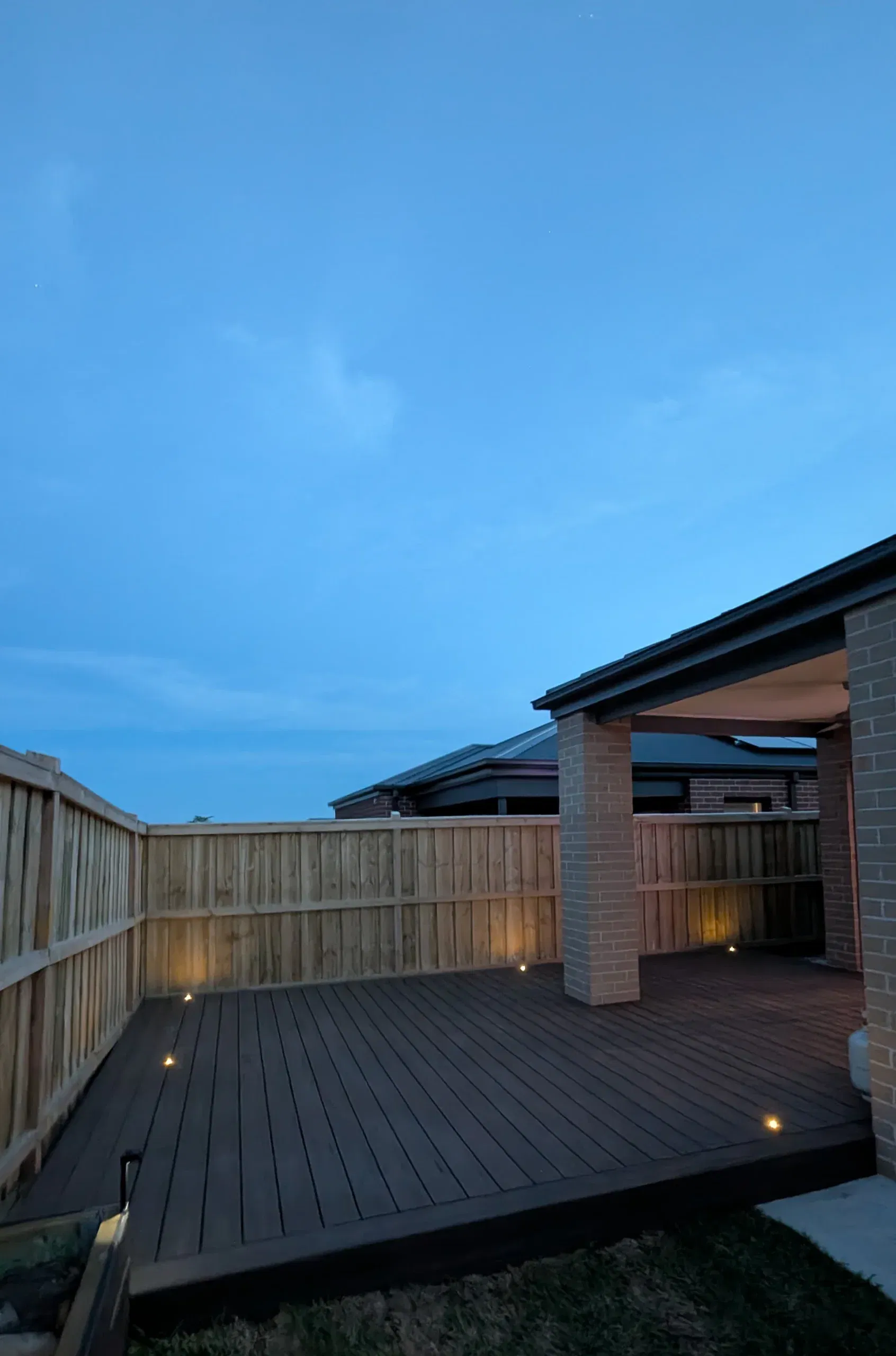 Wollert deck with steps, planters and new lawn