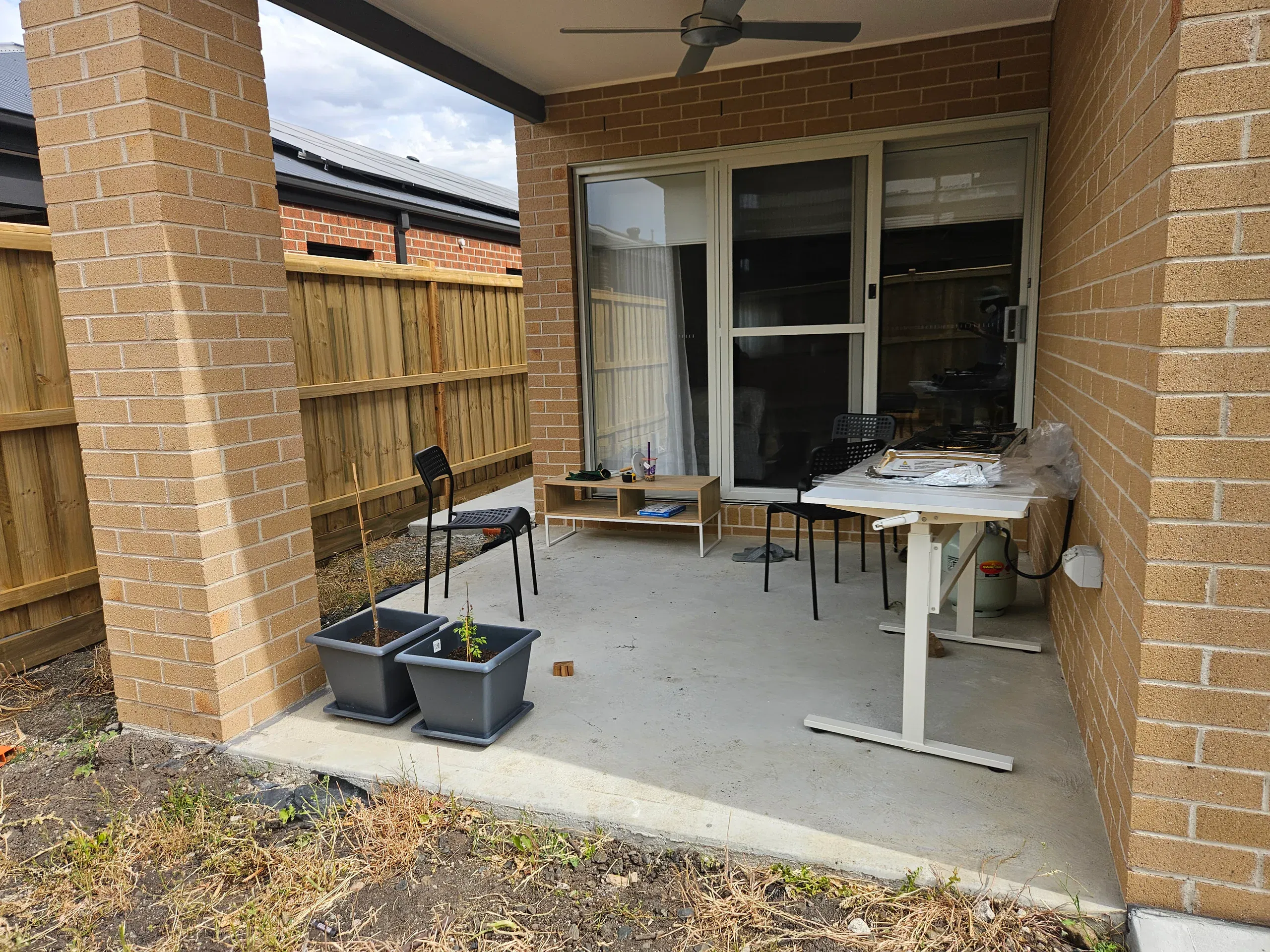 Wollert deck with steps, planters and new lawn