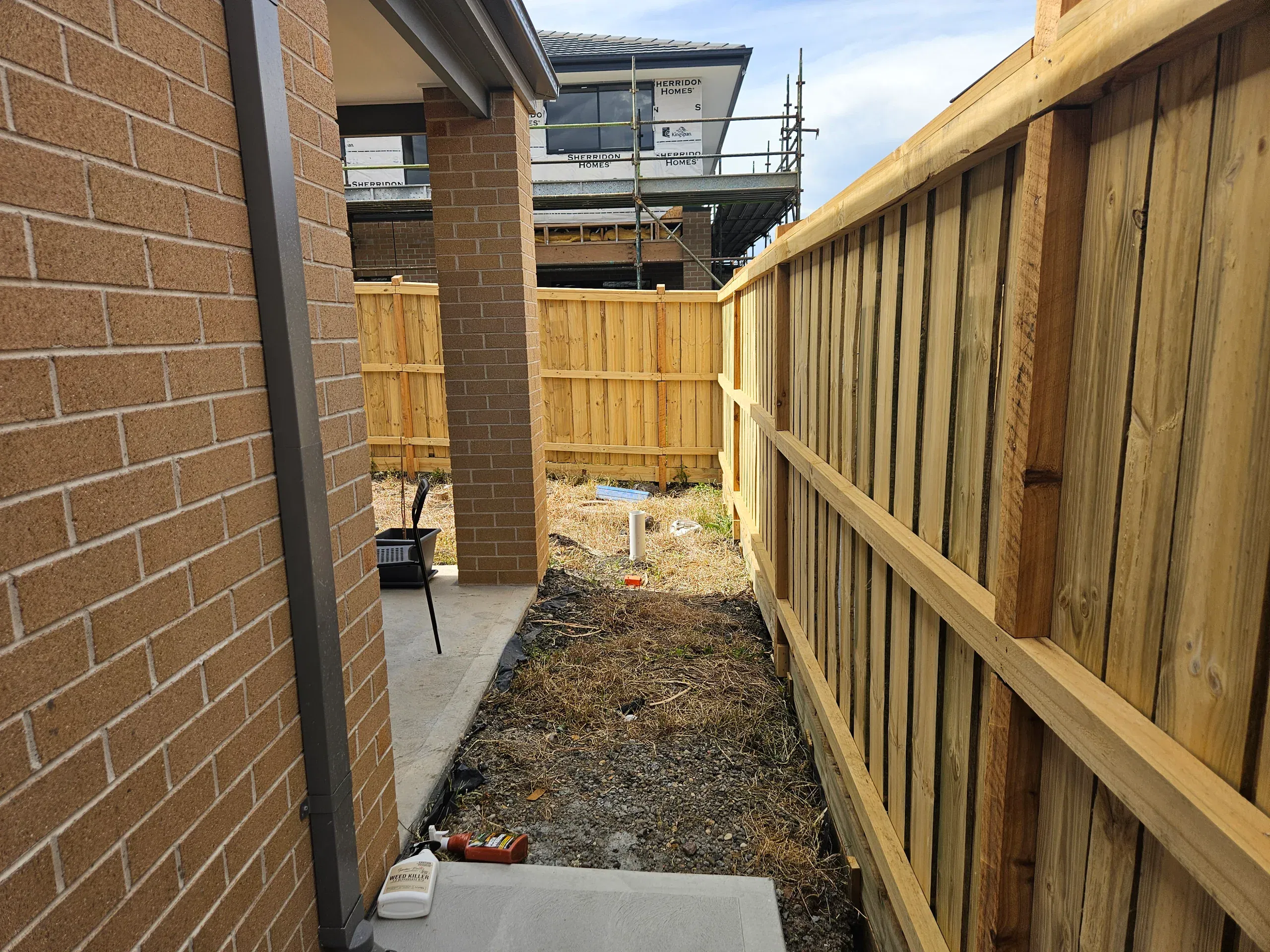 Wollert deck with steps, planters and new lawn