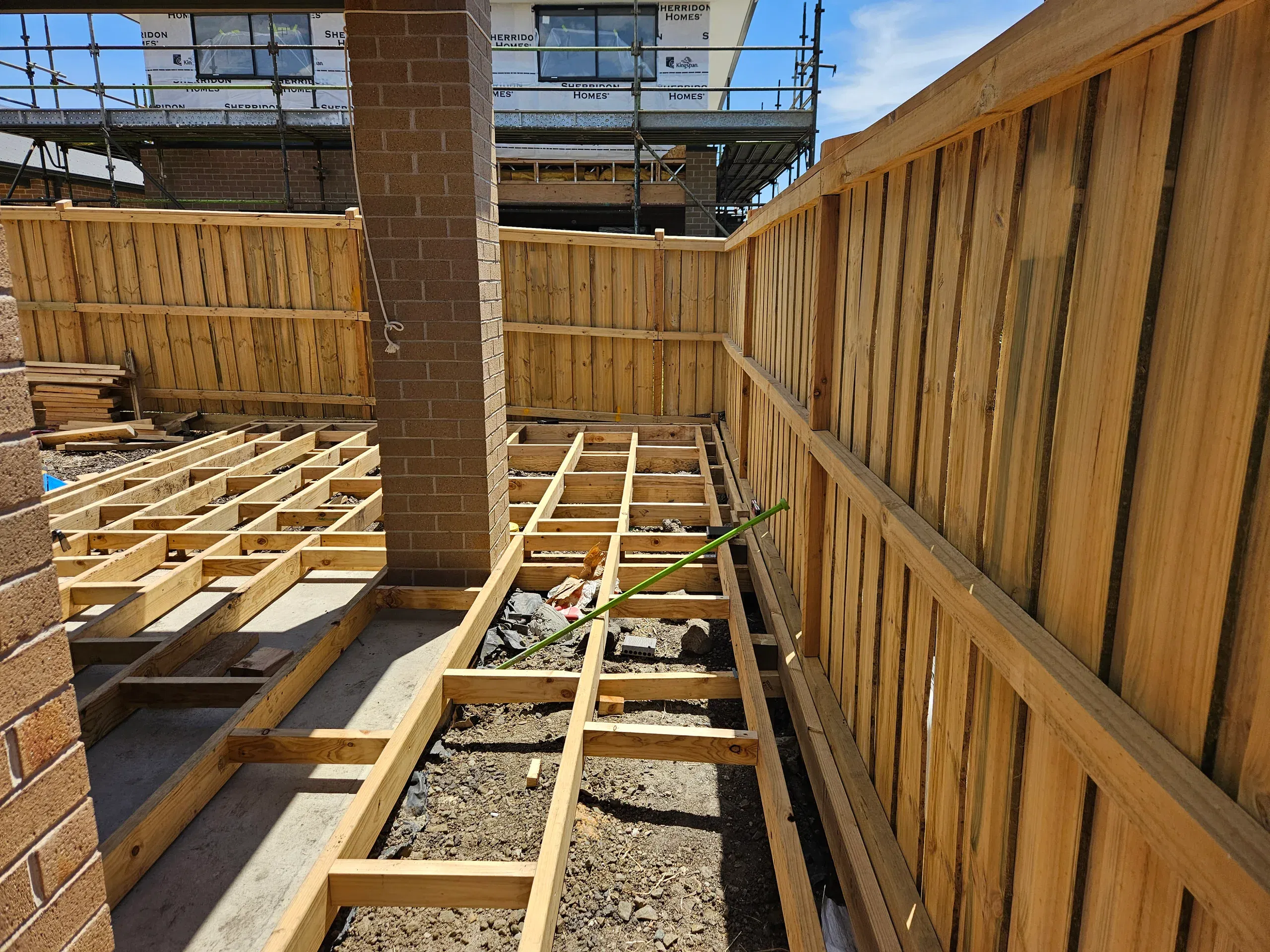 Wollert deck with steps, planters and new lawn